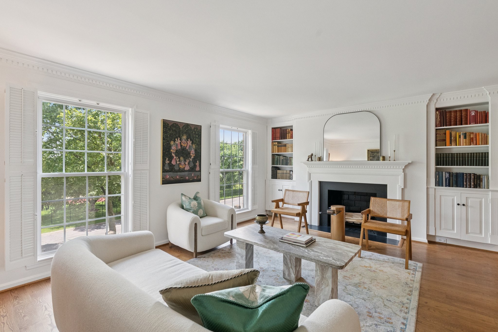 Living Room with Built-ins & Wood Burning Fireplace