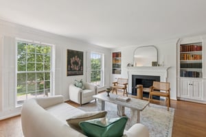 Living Room with Built-ins & Wood Burning Fireplace