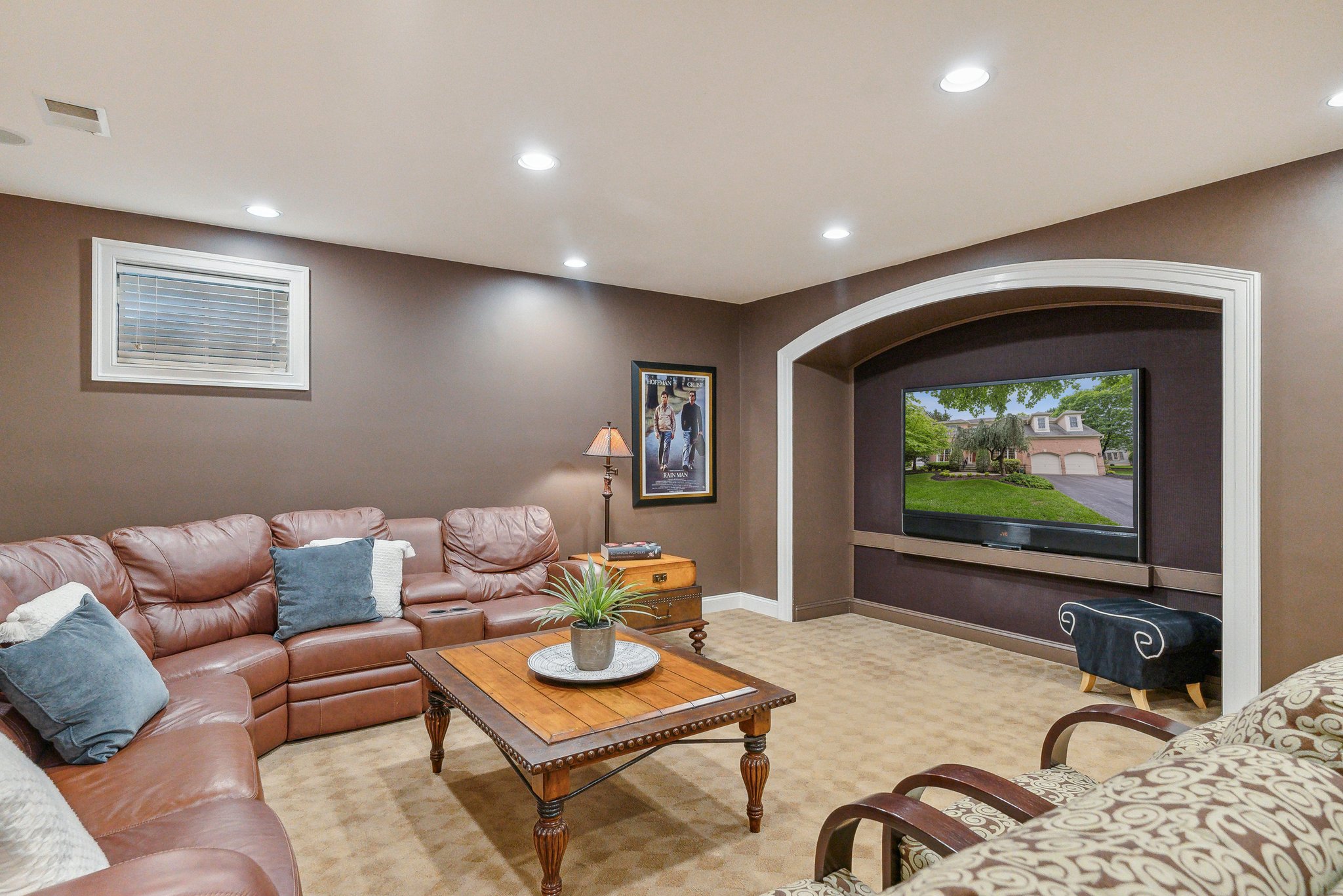 Lower Level Theater area with recessed TV,  and Surround sound