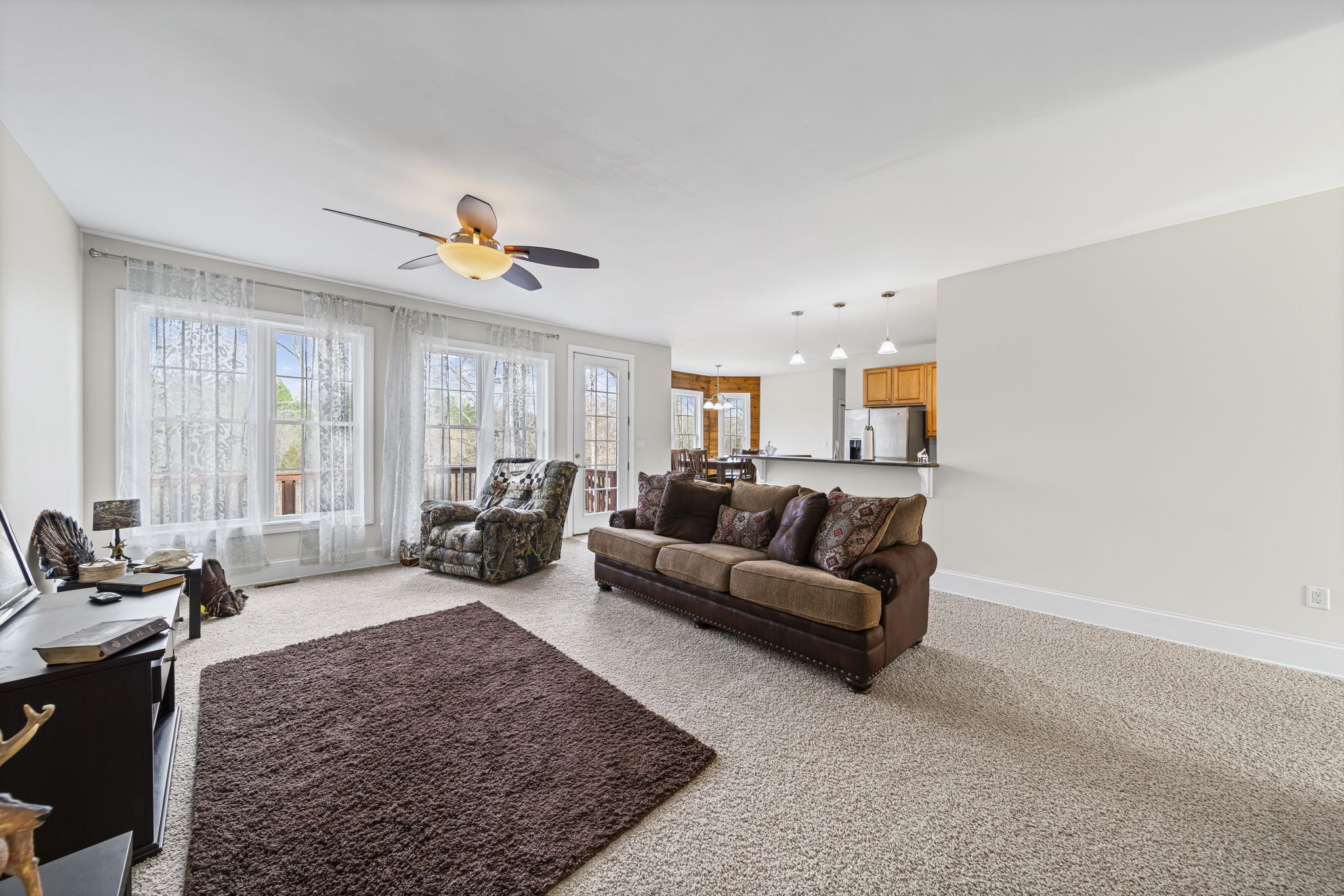Open floor plan connects kitchen, living and dining areas