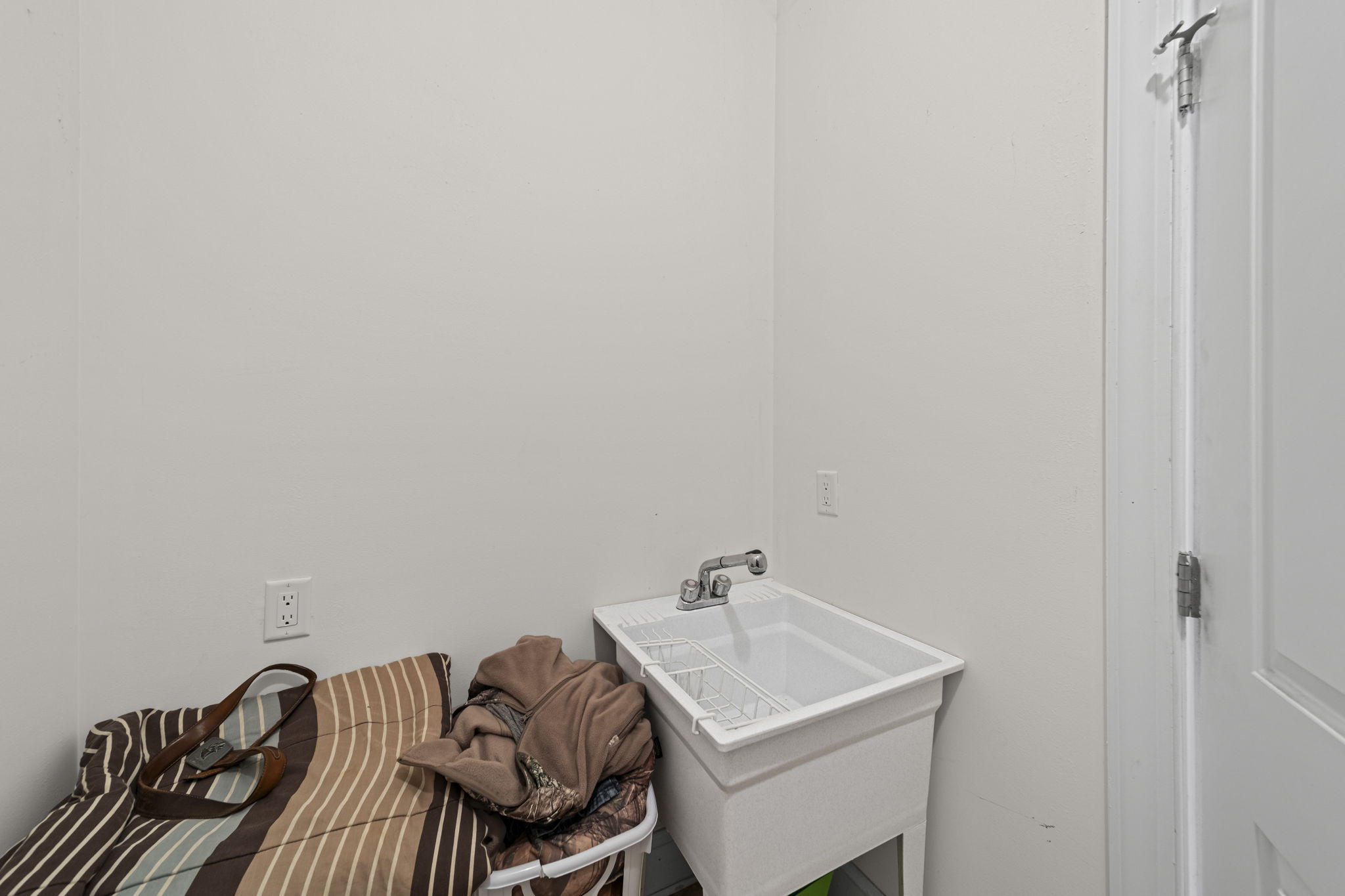 Laundry Room with wash sink.