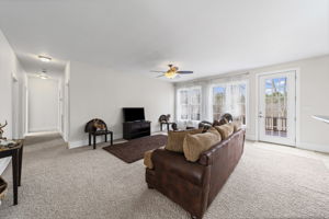 Spacious living room with 9' ceilings throughout home.