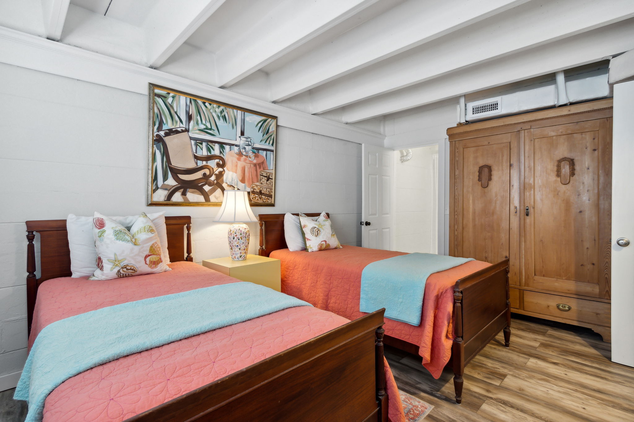 It comes fully furnished with colorful decor that creates a fun beachy vibe ...