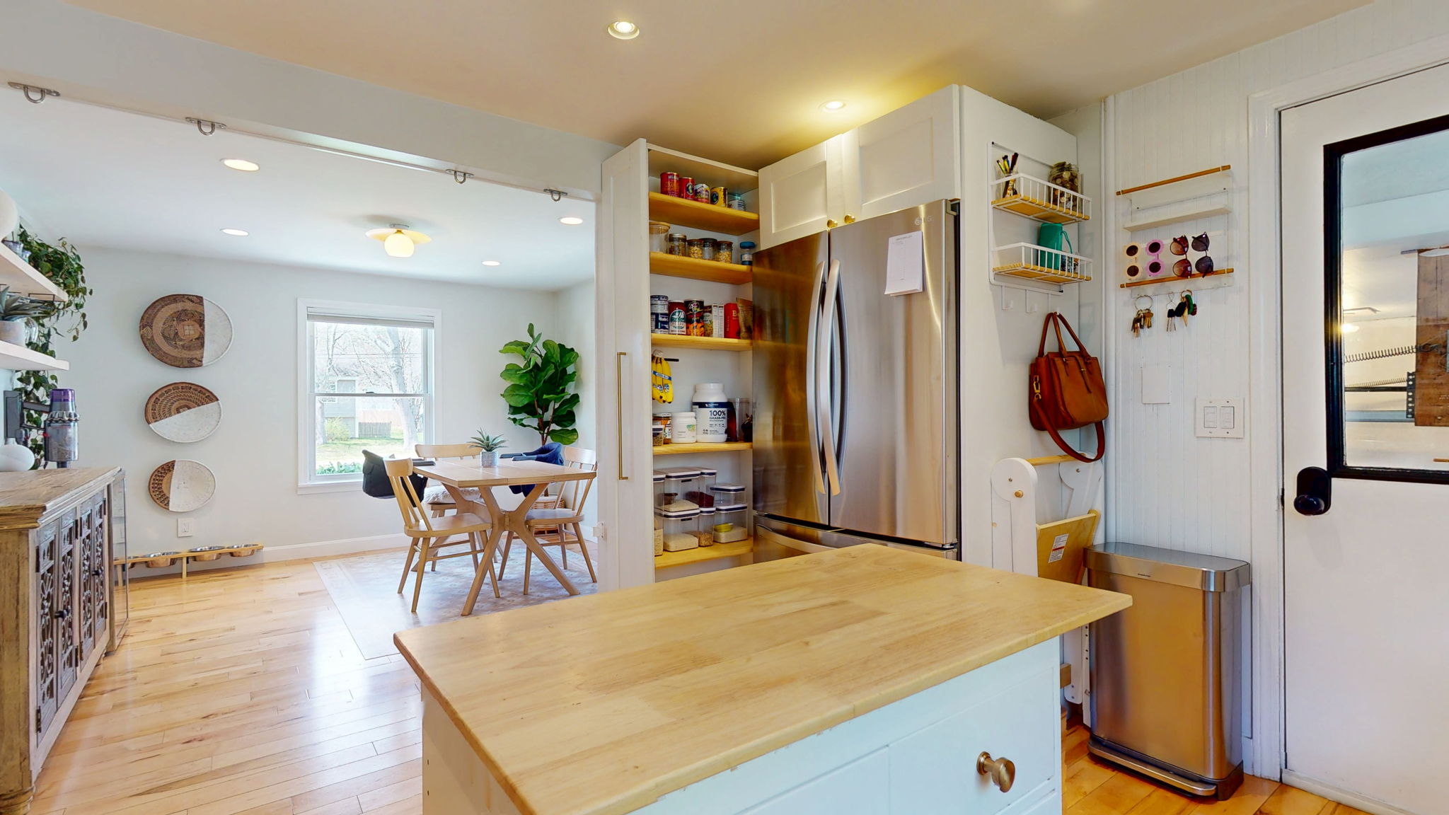 Pantry cabinet slides closed until hidden