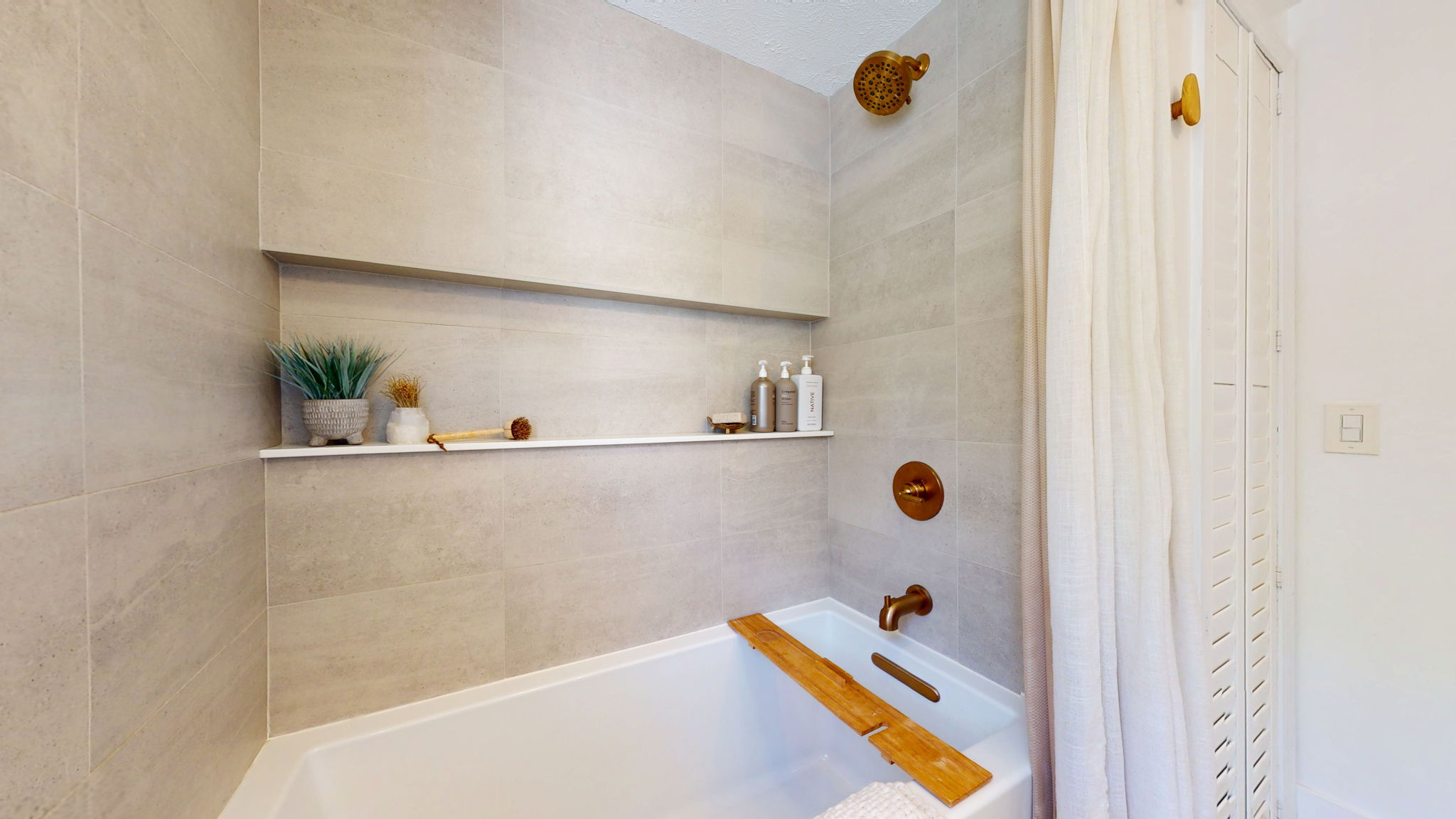 Spa-like tile work, and linen closet