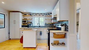 One of the pantry closets at the left