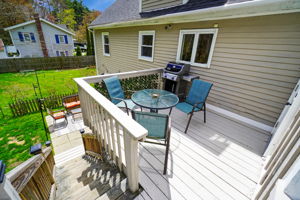 Deck near kitchen, plus patio