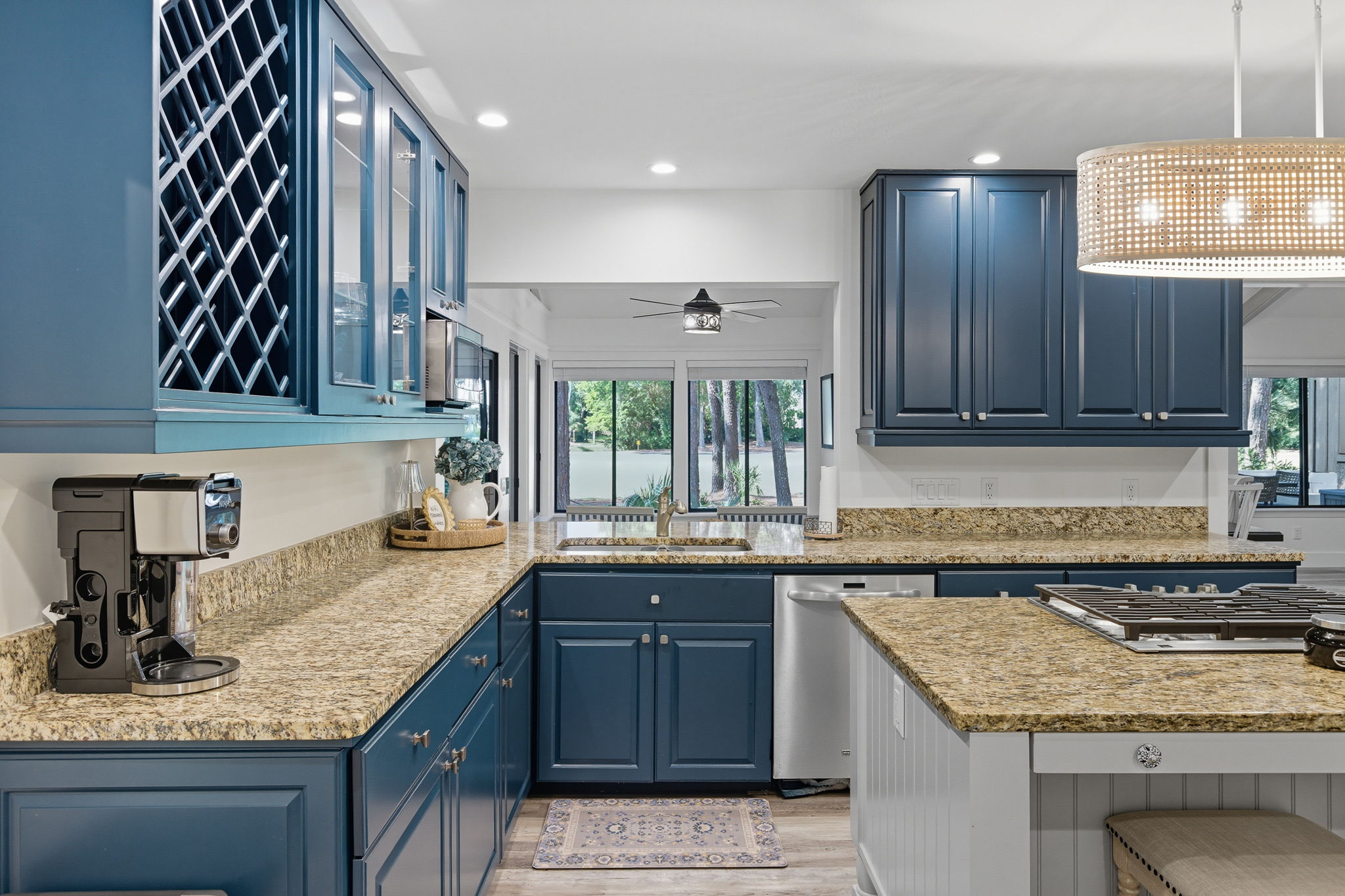 Plenty of storage and golf views in the kitchen.