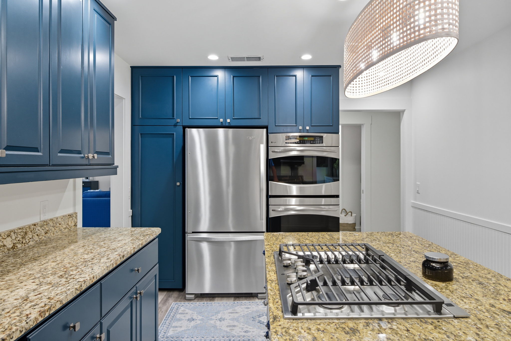 Stainless steel appliances in the kitchen.
