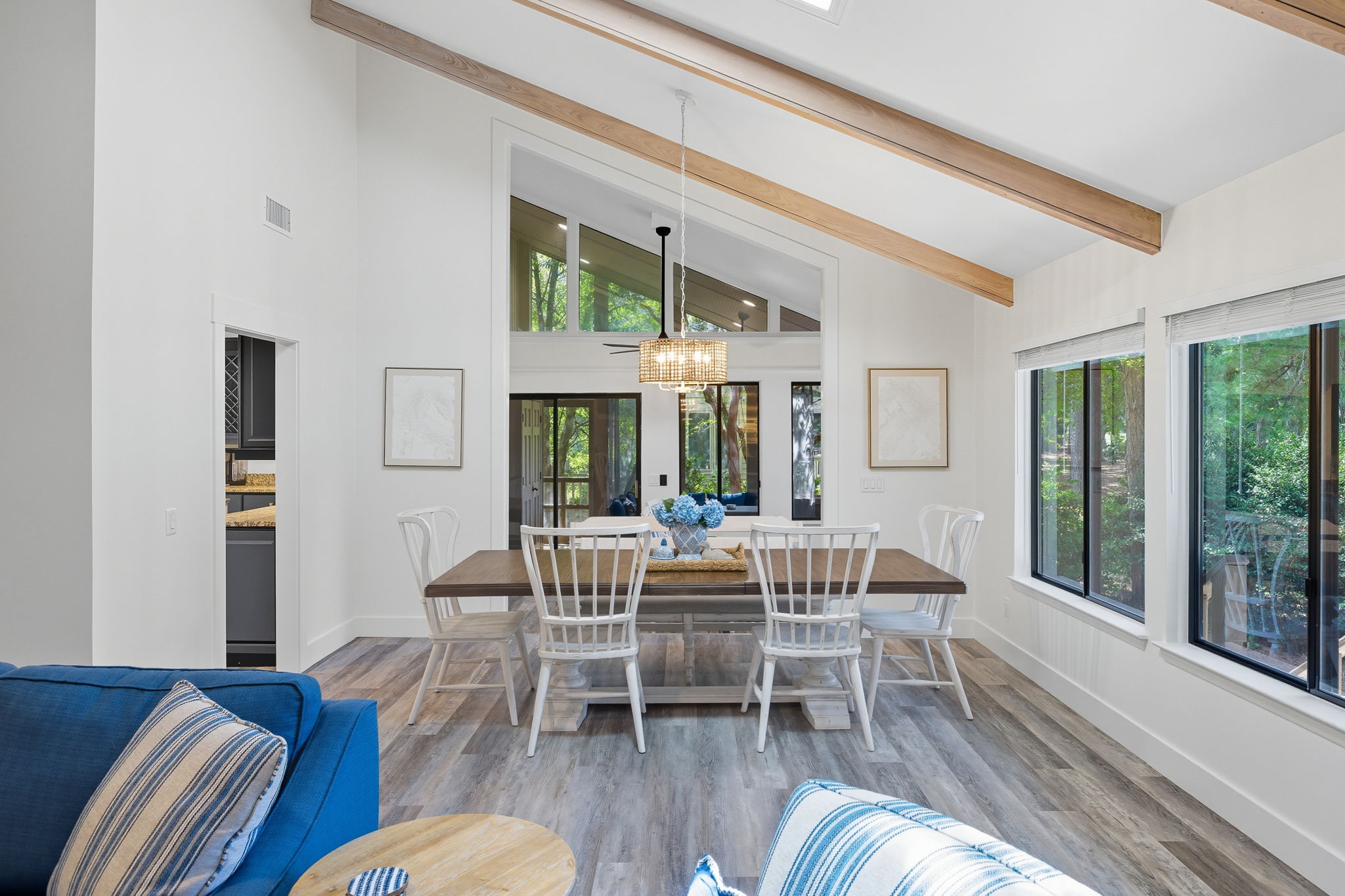 Dining area with view to screened-in porch.