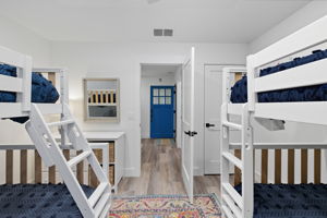 Bunkroom with view to hallway.