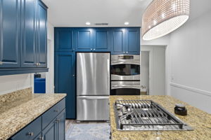 Stainless steel appliances in the kitchen.