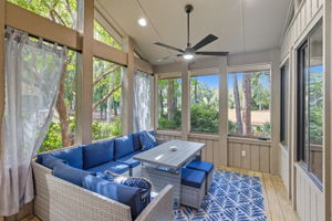 Plenty of seating in the screened in porch and oh that view again!