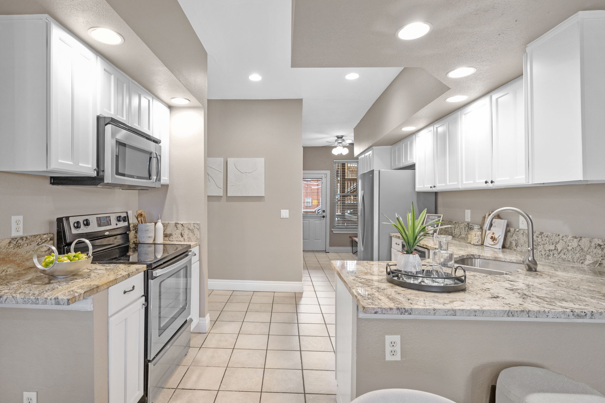 Mud room, Laundry room, & Back Door through Kitchen