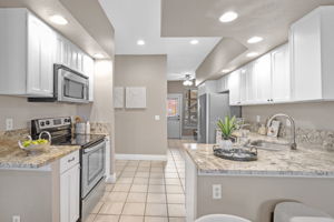 Mud room, Laundry room, & Back Door through Kitchen