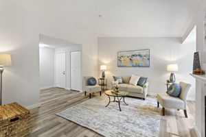 The entry is offset from the living room, so arrival doesn’t cut through the main seating area.