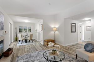 The living area stays open to dining, while the bedroom wing turns away for a little more separation and privacy.