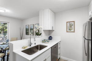 The green outlook reaches all the way into the kitchen.