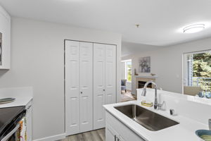 Dedicated pantry keeps kitchen storage close at hand and out of sight.