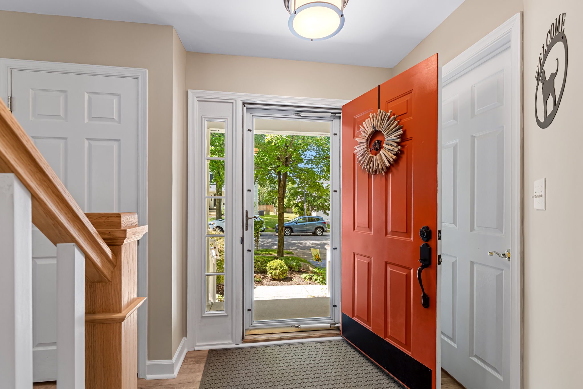 Entryway - Hall Closet On Left - Powder Room on Right