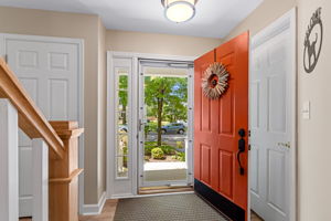 Entryway - Hall Closet On Left - Powder Room on Right