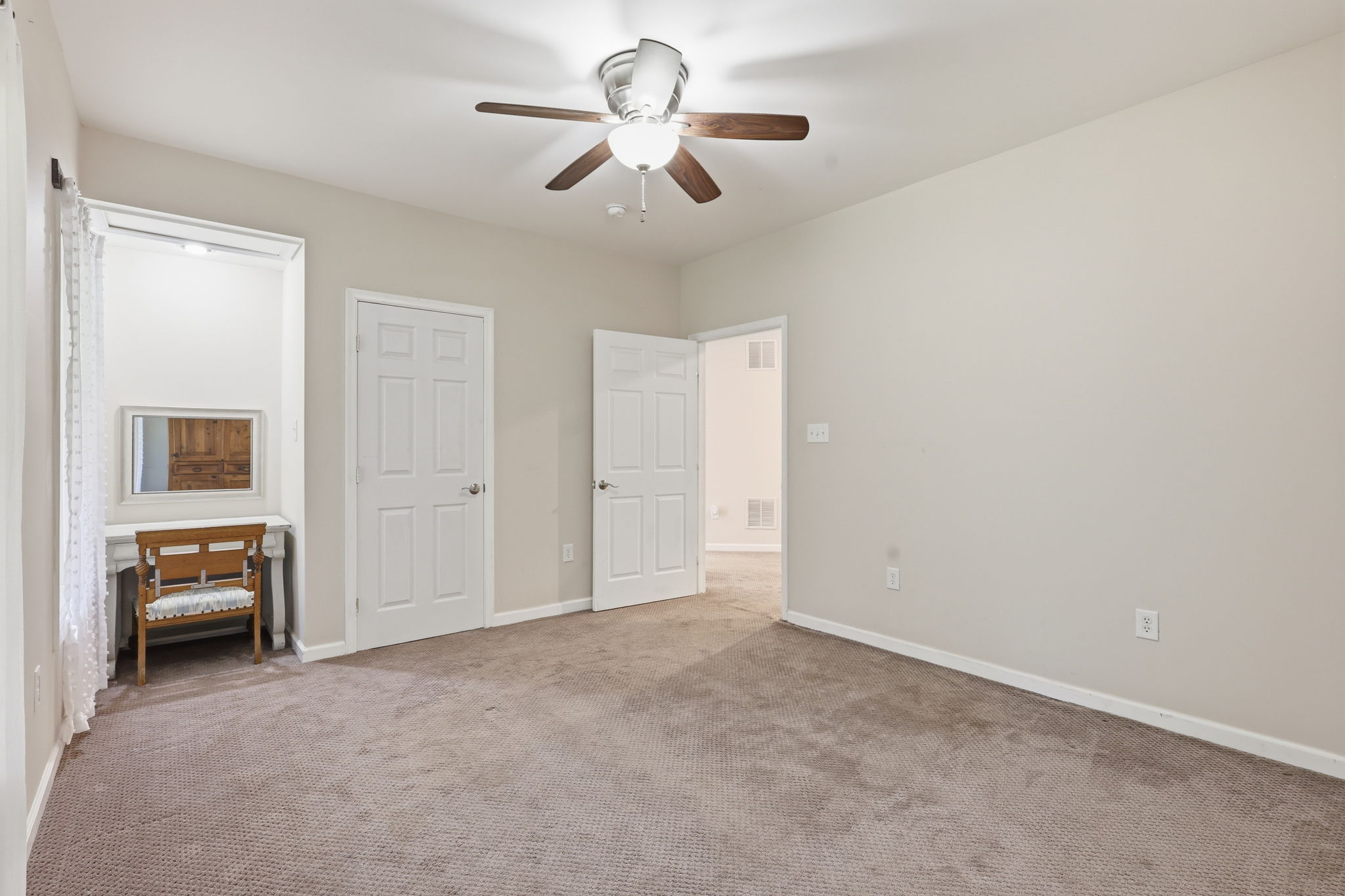 Bedroom 5 with desk space and two closets