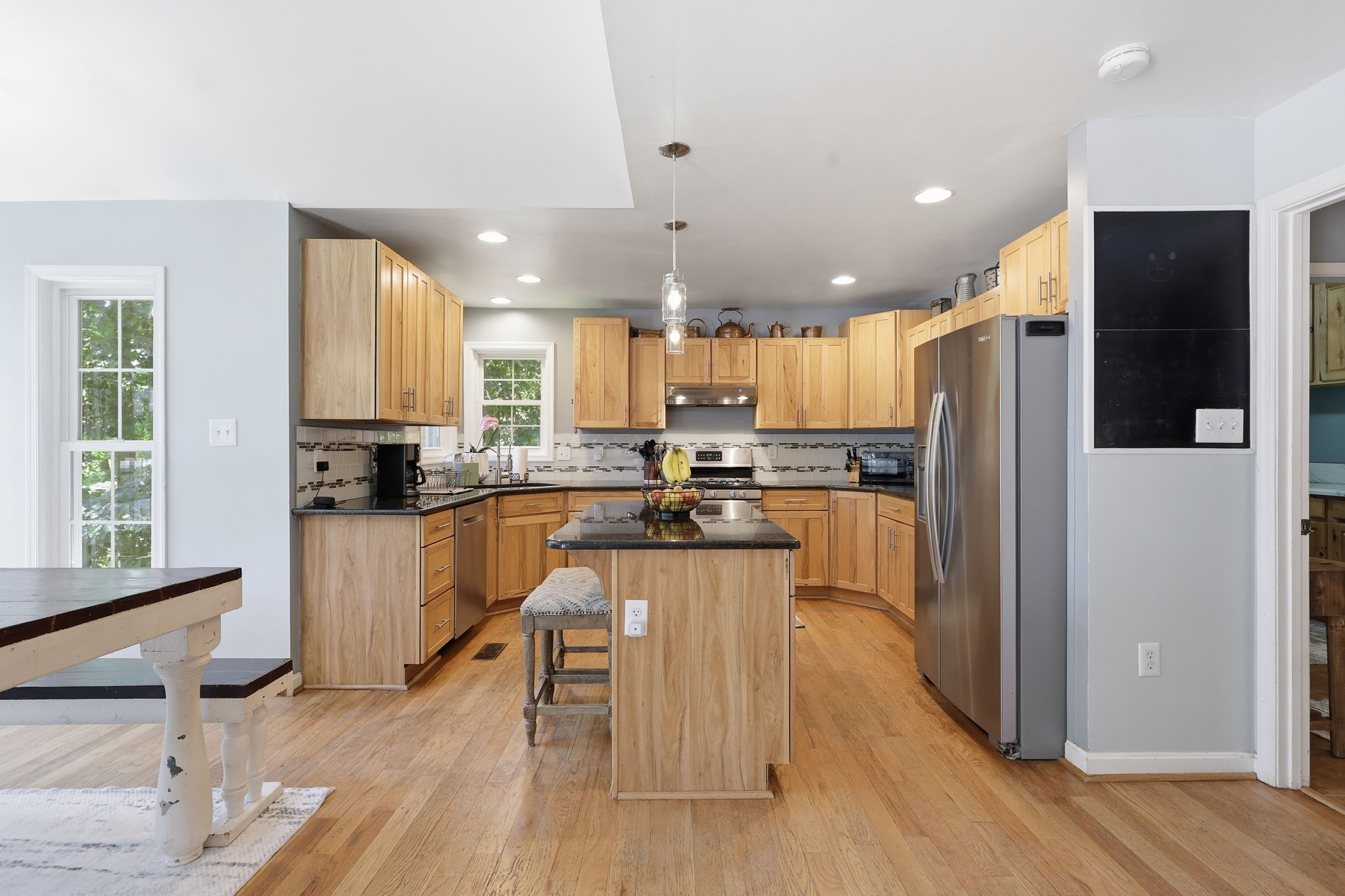 Kitchen with eat-in bump out and island