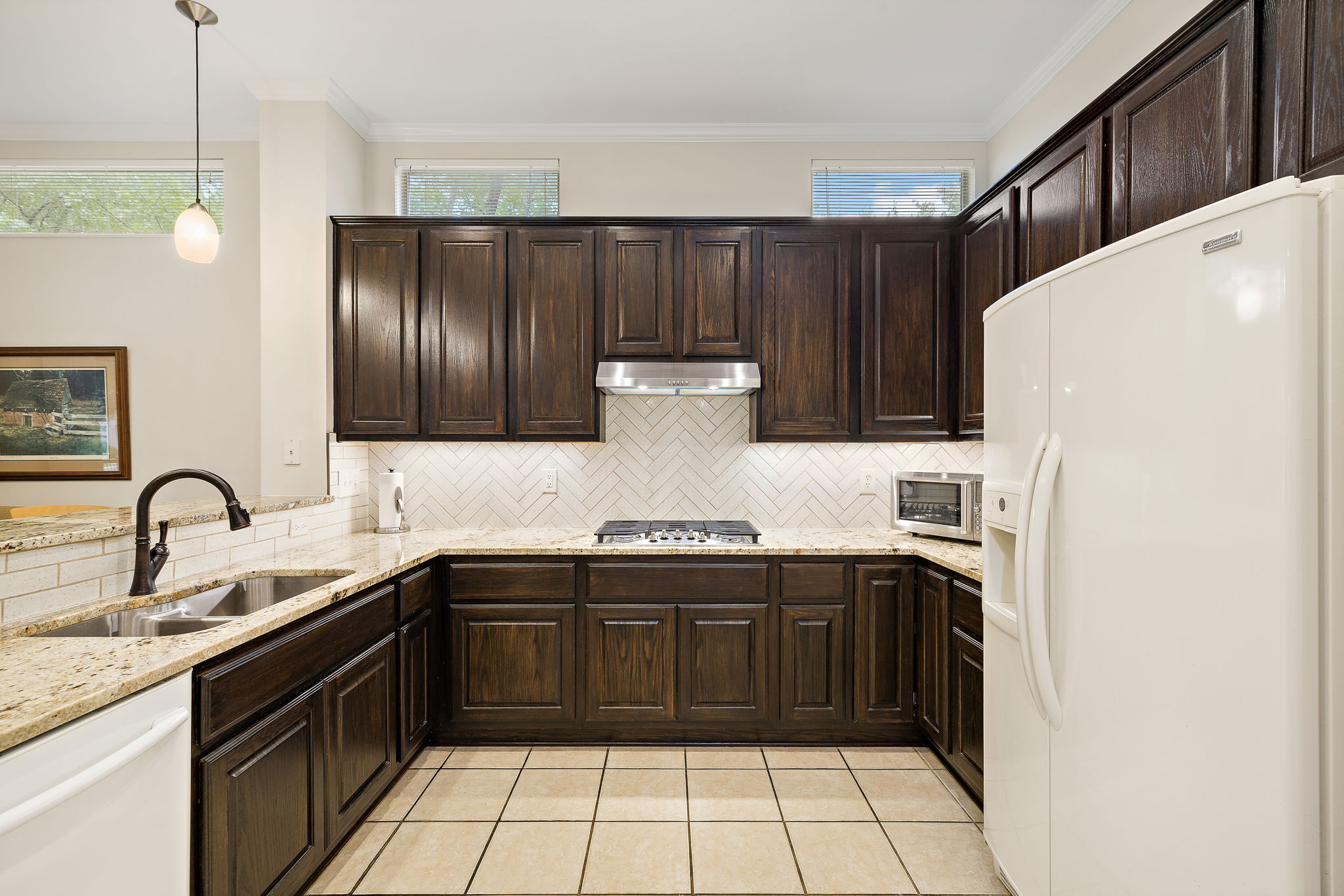 Generous cabinet space with gorgeous granite counter tops