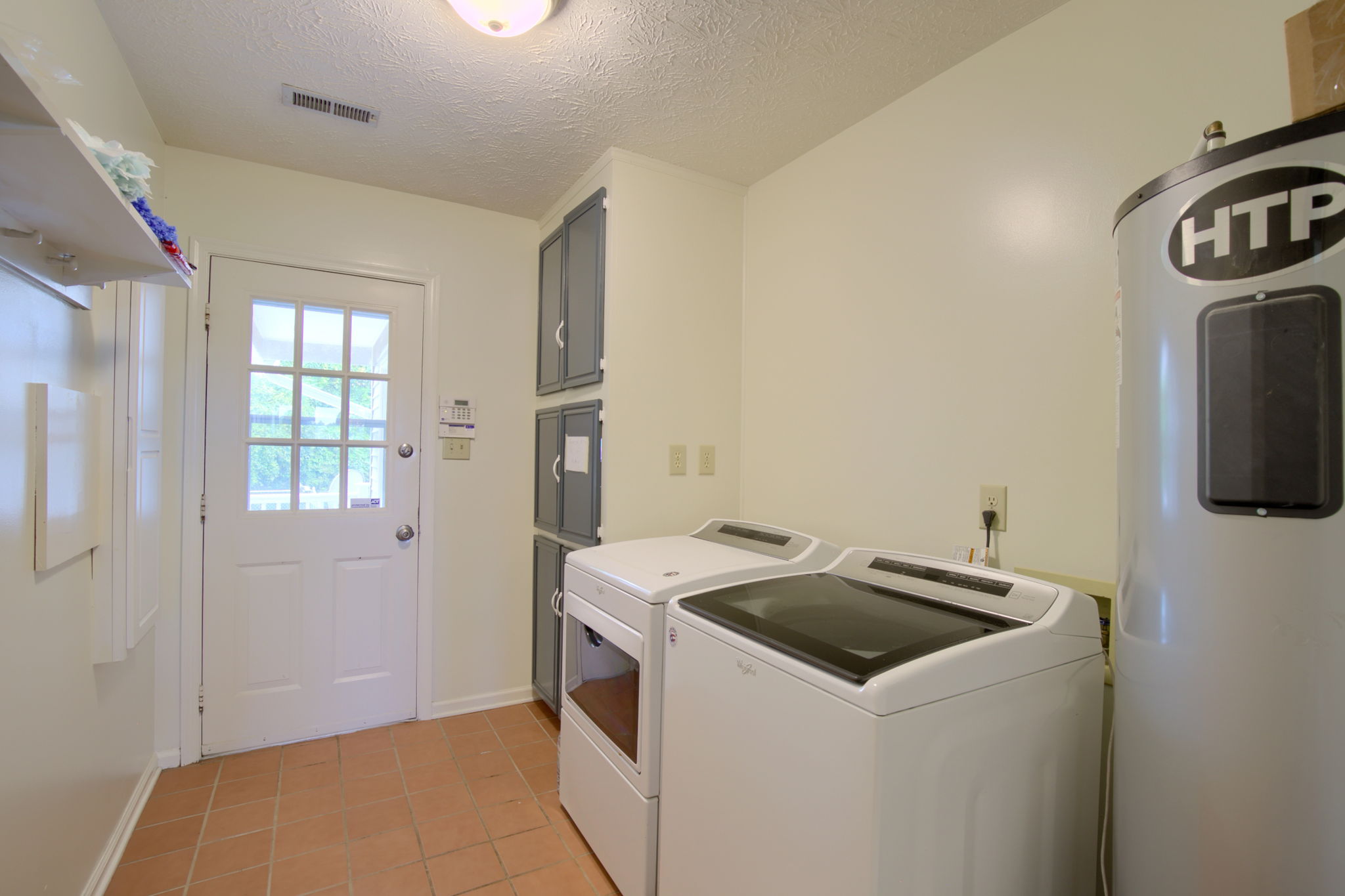 Mud/Laundry room. Access to 4th bedroom