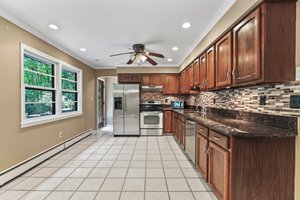Kitchen: Granite Counters, Ceramic Tile