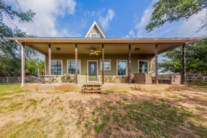 1.4 acre hill country home offers privacy, gorgeous oak trees, warehouse & pet friendly