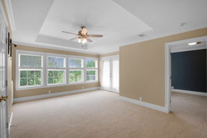 Second floor living room with balcony access