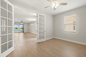 Bright, spacious den with french doors