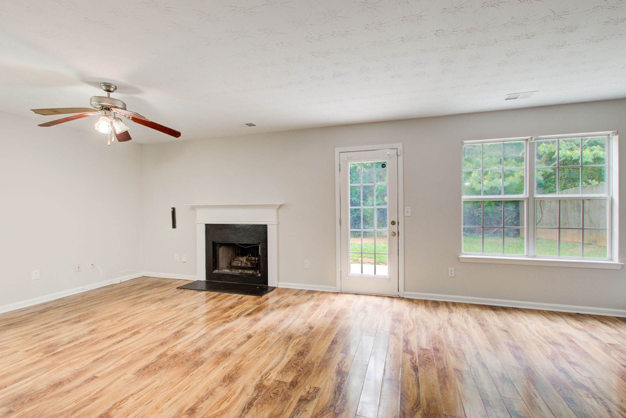 13 Living Room Partial B w Fireplace + Ext Walkout