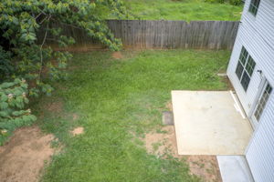 15 Aerial Back Yard w Patio + Ext Rear Partial