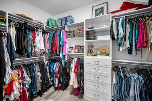 Primary Bedroom Walk-in Closet1a