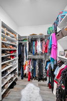 Primary Bedroom Walk-in Closet1b