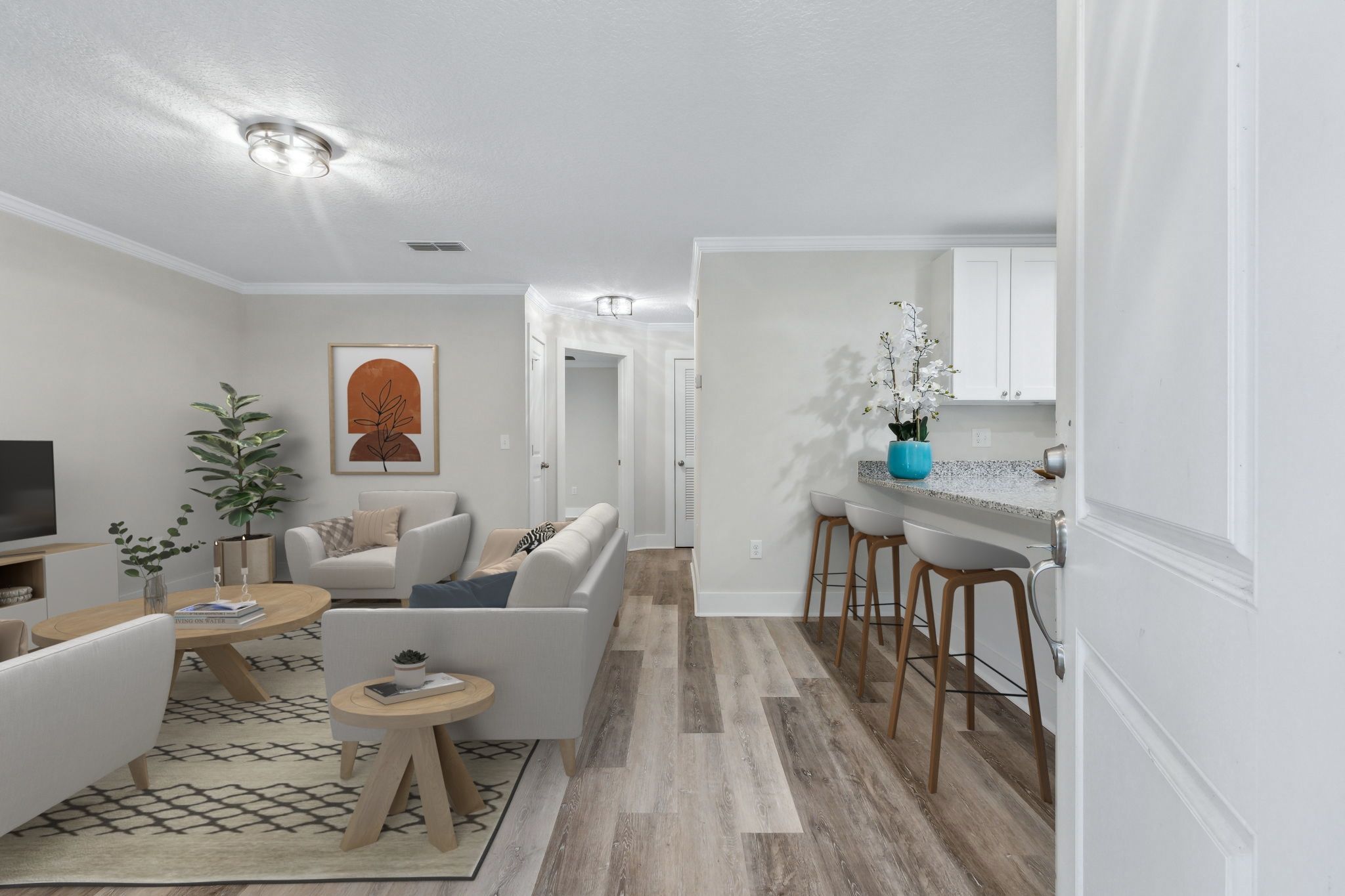 Luxury wood-look plank flooring extends throughout the home—zero carpet, all style. (Virtually Staged)