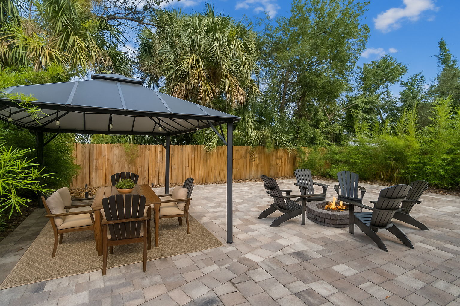 The fenced backyard has been transformed into a private oasis (virtually staged)...