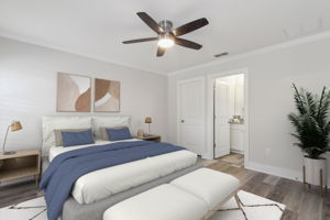 This roomy master suite fits king-size furniture with ease (virtually staged) ...