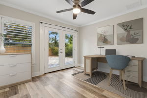 The versatile 3rd bedroom with French doors to the backyard is perfect for guests or as a home office. (Virtually staged.)