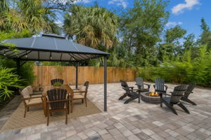 The fenced backyard has been transformed into a private oasis (virtually staged)...