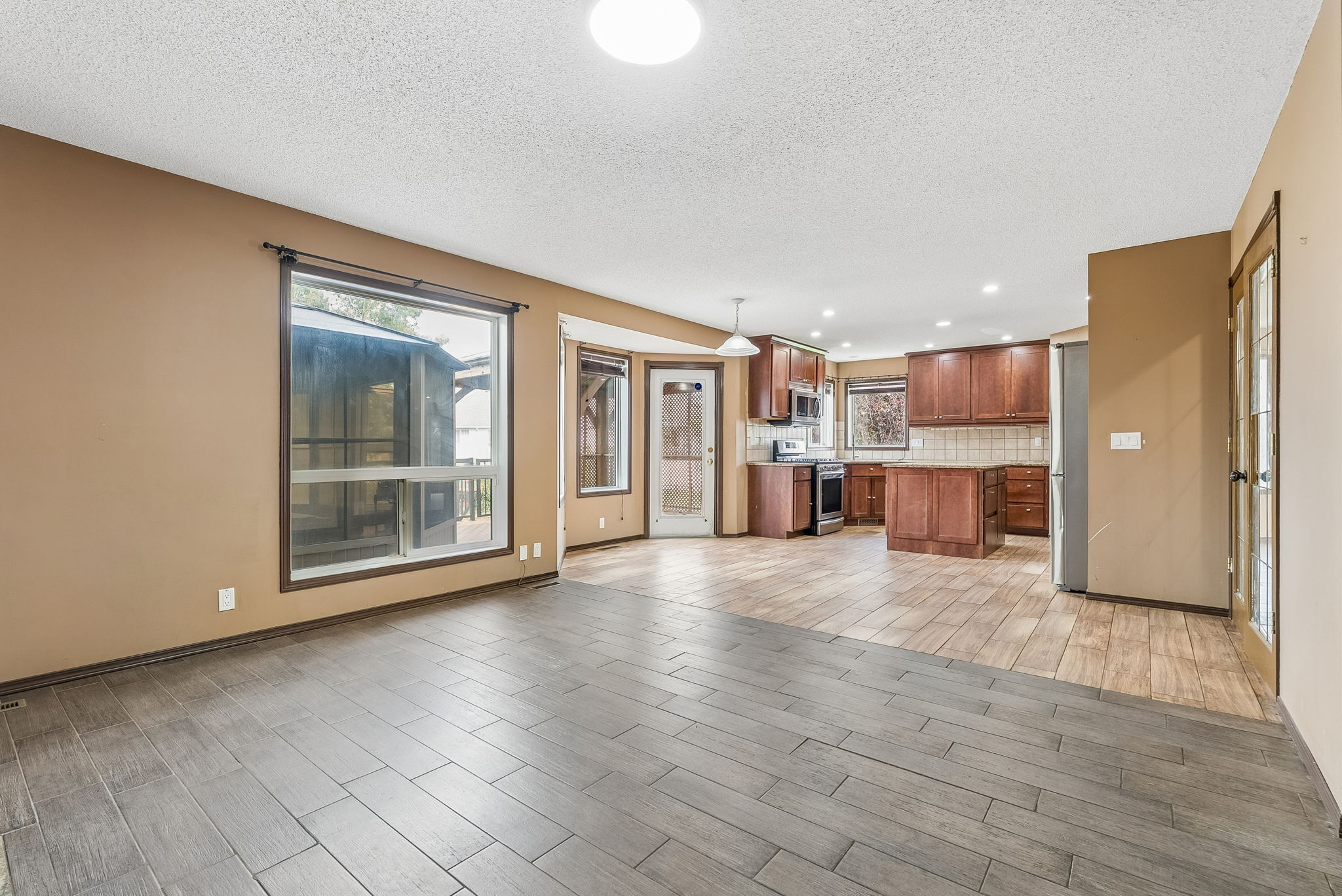 08.07.2026 - Carson Harris - 1116 Woodside Way NW, Airdrie_12