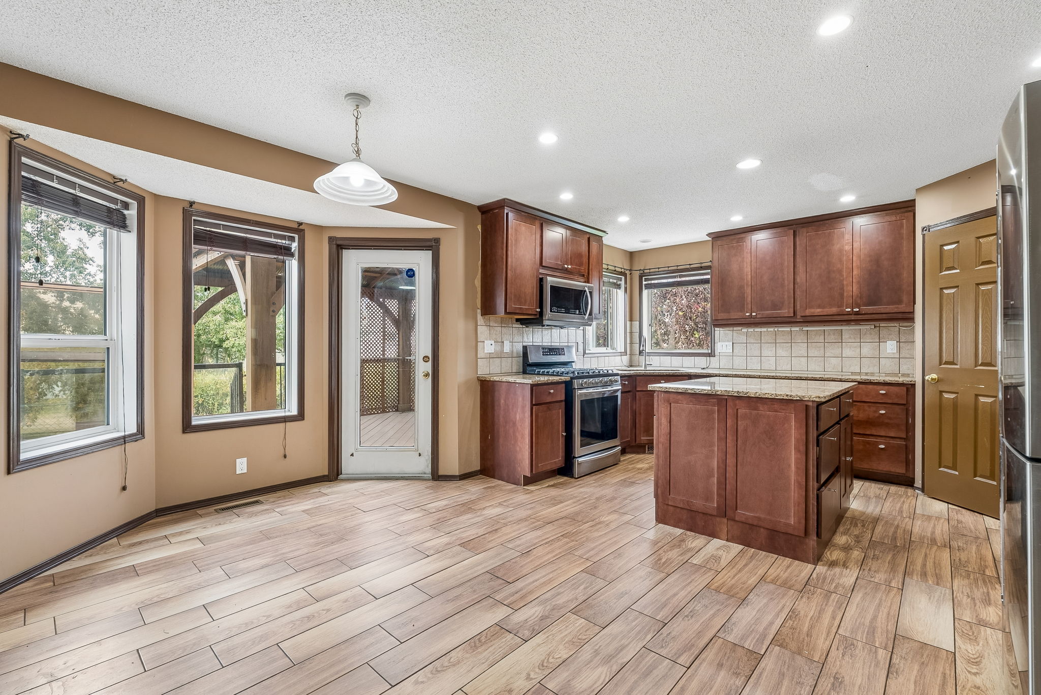 08.07.2026 - Carson Harris - 1116 Woodside Way NW, Airdrie_14