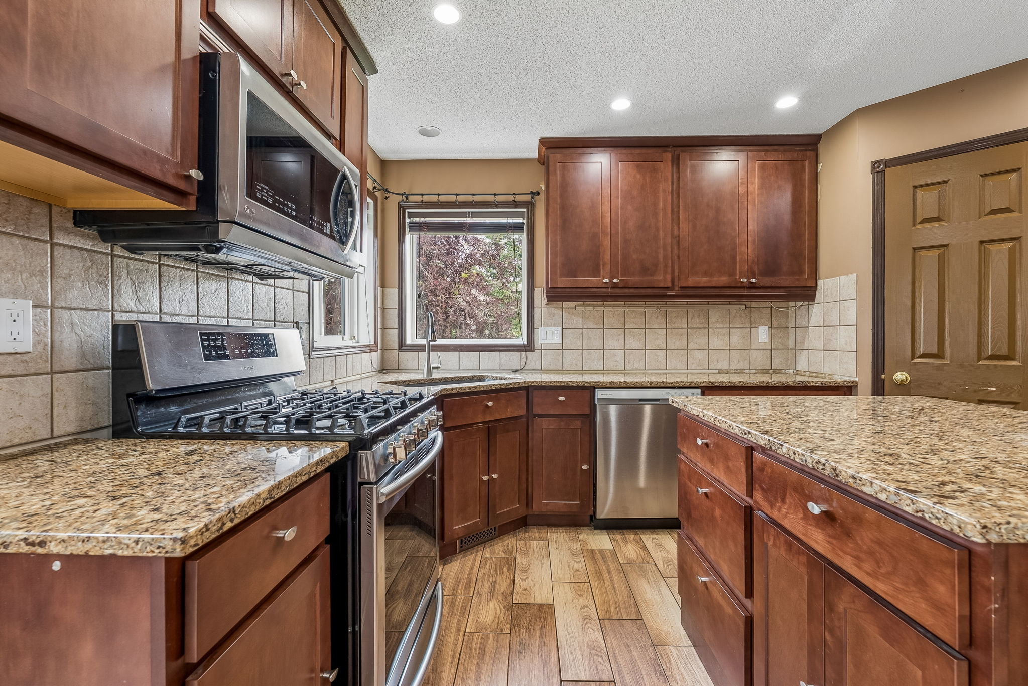 08.07.2026 - Carson Harris - 1116 Woodside Way NW, Airdrie_16
