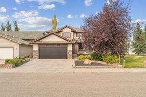 08.07.2026 - Carson Harris - 1116 Woodside Way NW, Airdrie_01