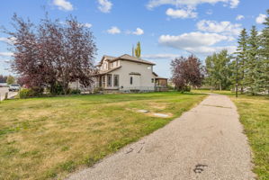08.07.2026 - Carson Harris - 1116 Woodside Way NW, Airdrie_04