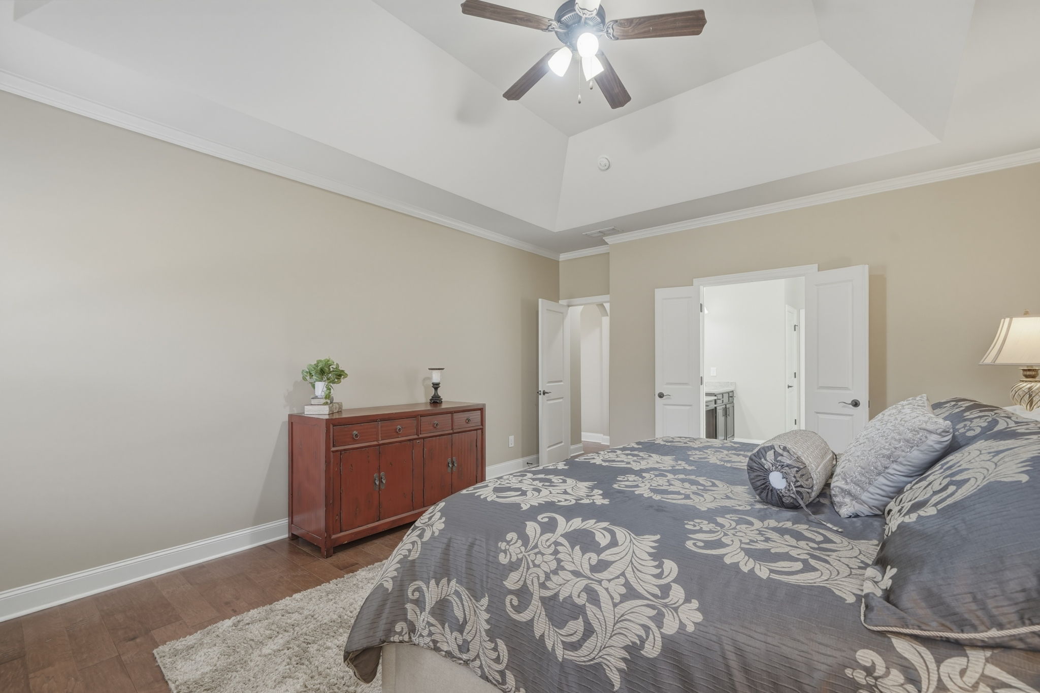 Primary Bedroom has trey ceiling and lots of space to relax