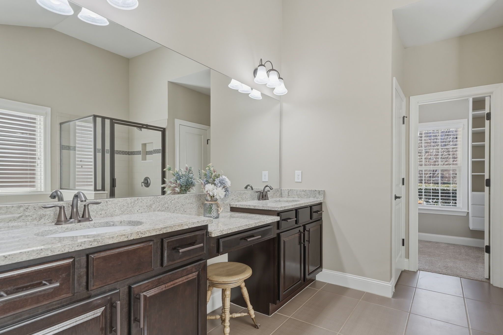 Primary Bath with double vanities and a sit down grooming area