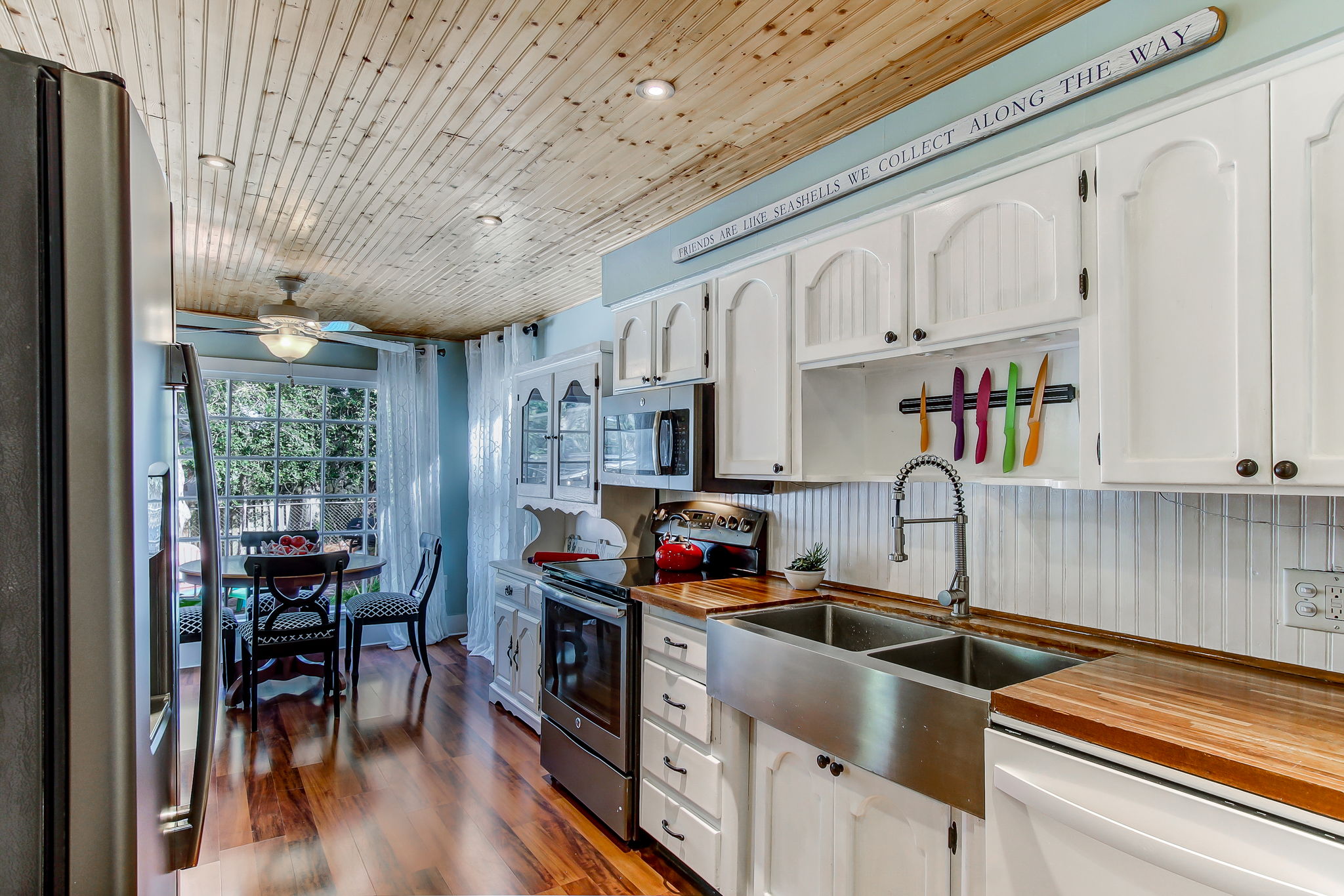 Remodeled kitchen with tongue and grove pine ceiling